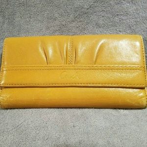 Mustard yellow Coach wallet